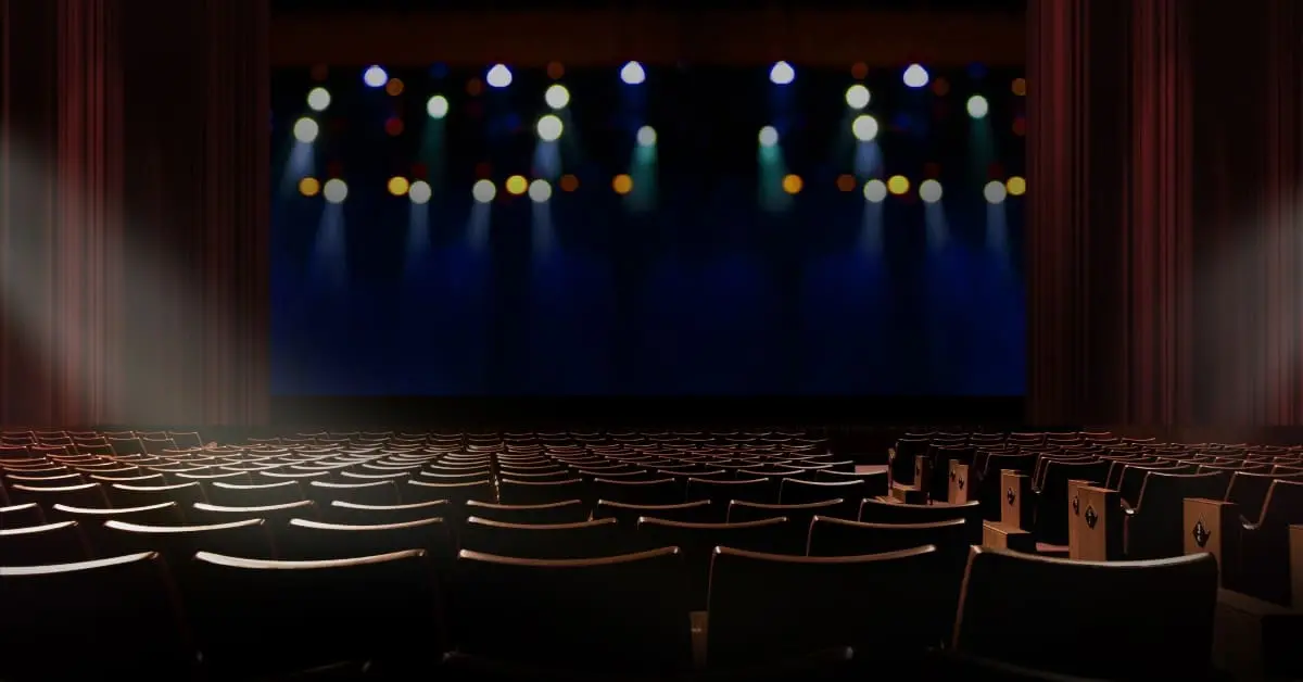 empty venue with seats and a stage
