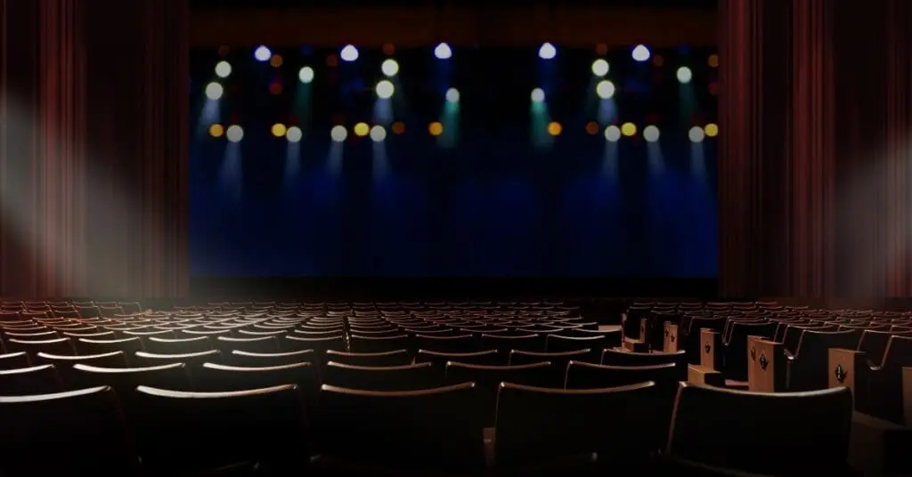 empty venue with seats and a stage