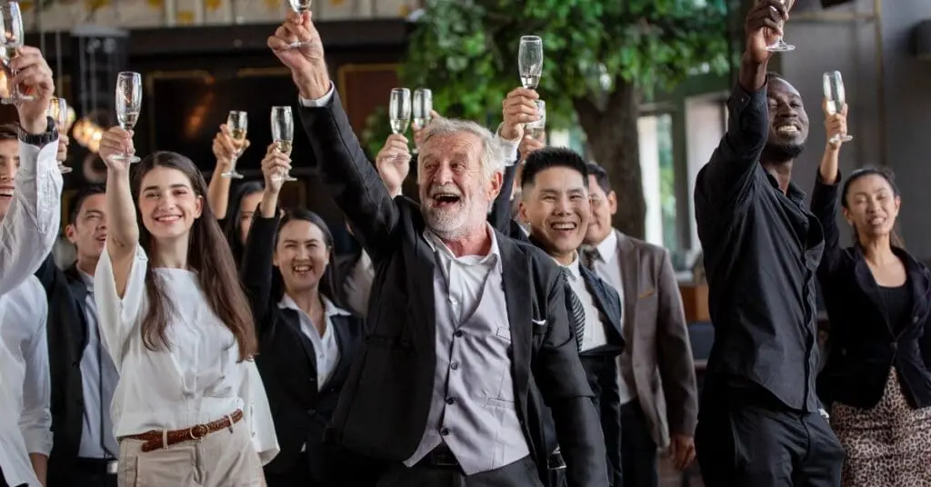 group of people toasting