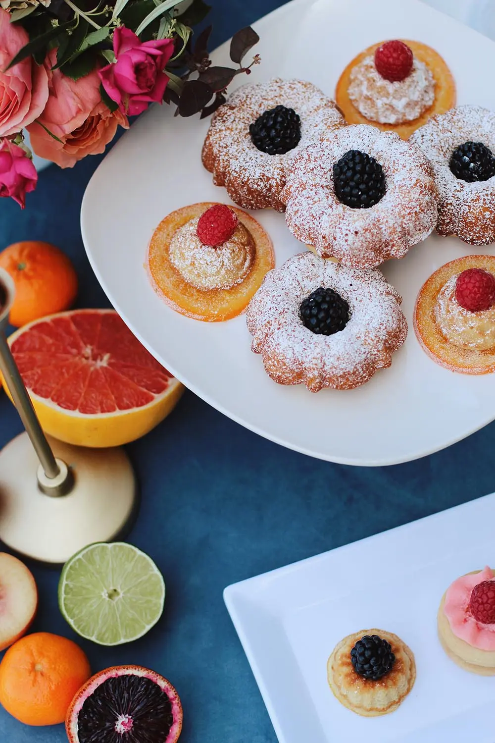 Assorted fruit tarts with berries and citrus on the dessert station
