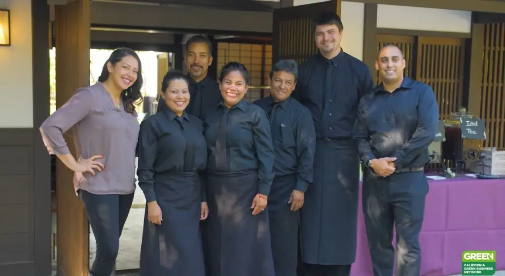Handheld Catering team in uniform at an outdoor event