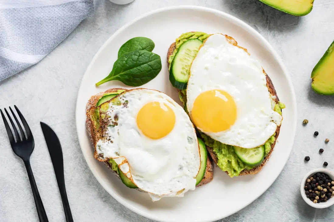 Avocado toast with fried eggs and spinach from the Handheld Catering brunch station