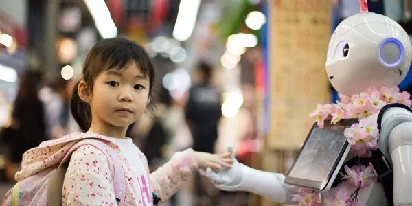 Little girl with a robot