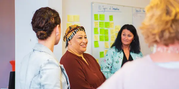 Three team members from the plunket team in a creative hq workshop