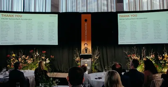GovTech Director on stage at the Beehive