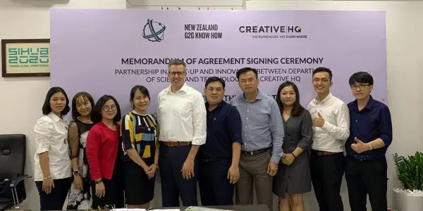 Creative HQ facilitator posing with the Ho chi minh team
