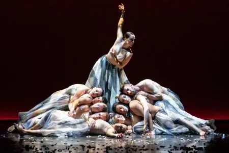 dancers in blue and white costume