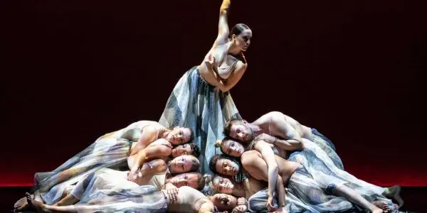 dancers in blue and white costume