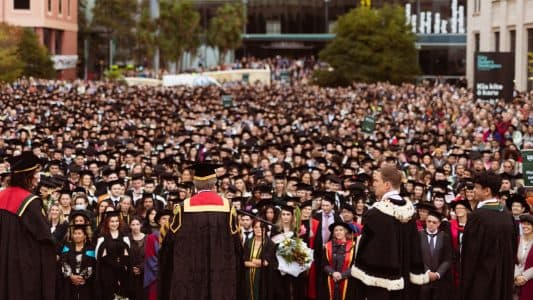 Large crowd of students at graduation