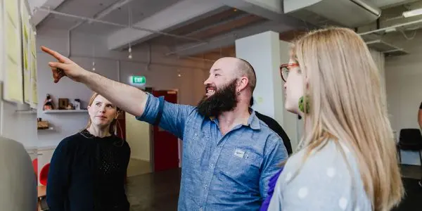 Man pointing at whiteboard