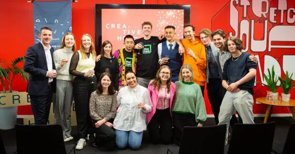 A team of young innovators pose for their showcase photo