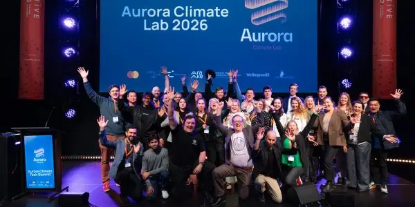 Climate tech founders celebrating Aurora Summit