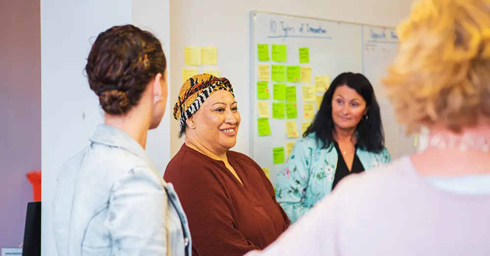 Three team members from the plunket team in a creative hq workshop