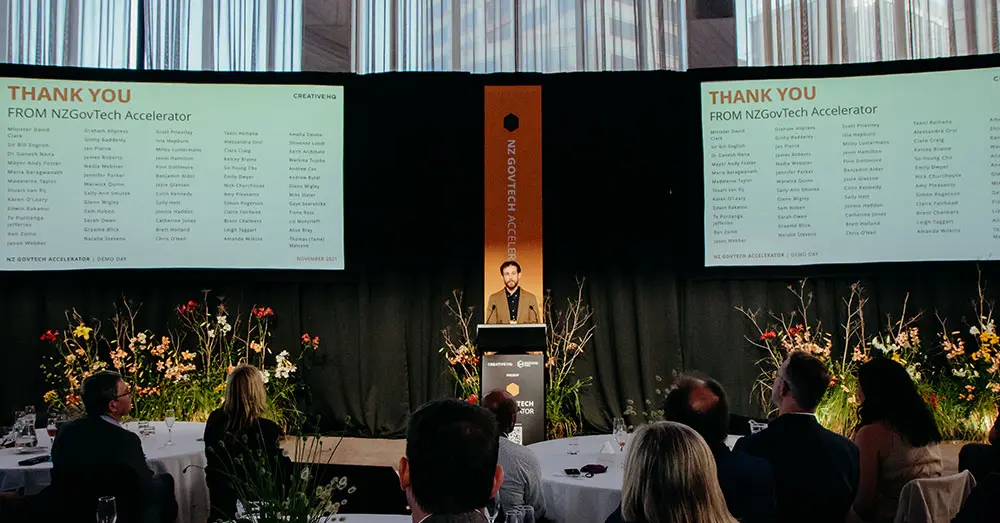 GovTech Director on stage at the Beehive