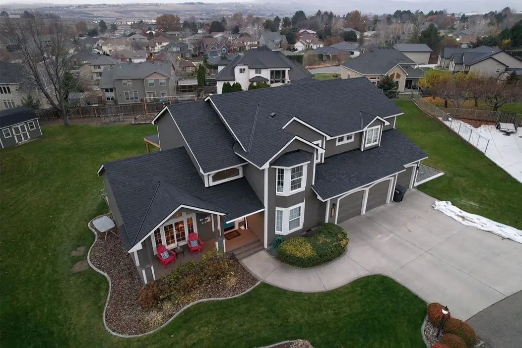Completed asphalt shingle roof replacement by Alpine Roofing in Kennewick, Washington