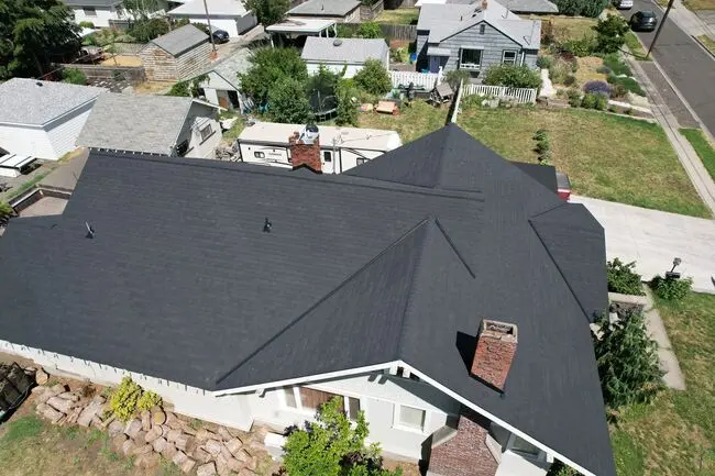 Overhead view of a home in Washington with a black roof.
