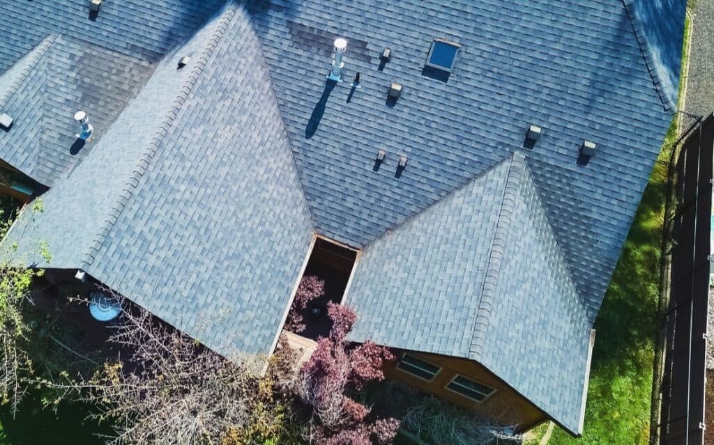 Aerial view of a grey shingle roof
