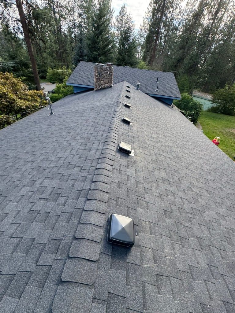 New CertainTeed Landmark in Moire Black roof installed by Alpine Roofing on W Appaloosa Rd, Coeur d'Alene