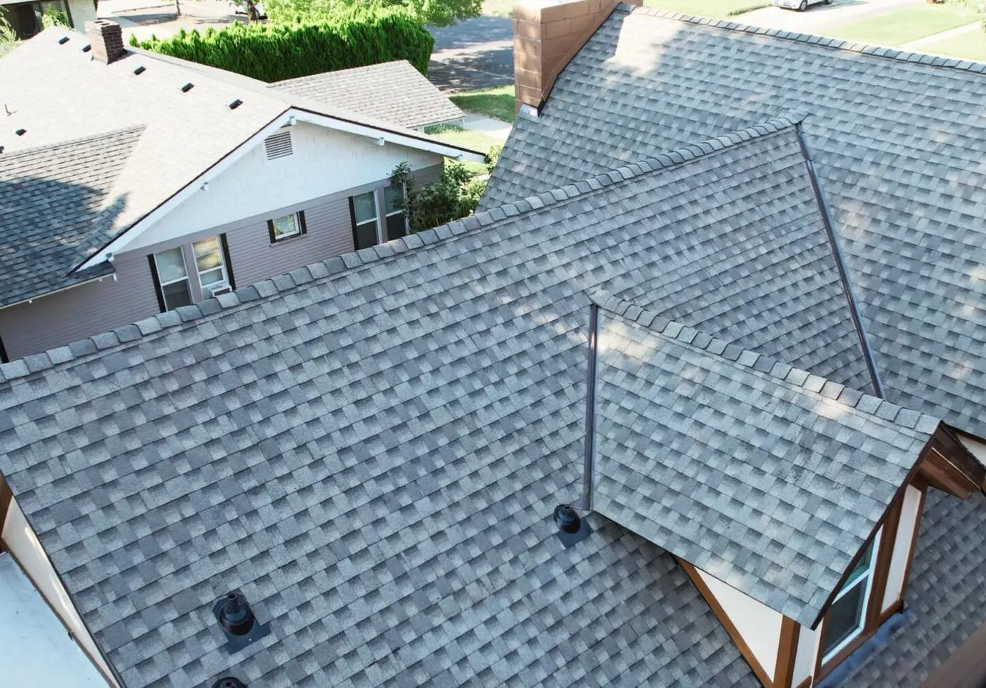 Completed asphalt shingle roof replacement on a home in Yakima, Washington by Alpine Roofing