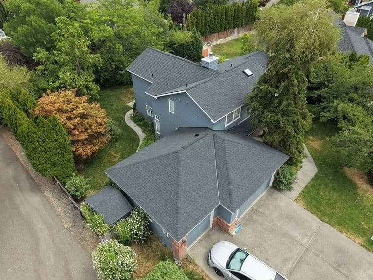 New CertainTeed Landmark in Moire Black roof installed by Alpine Roofing on Windwood Ln, Richland