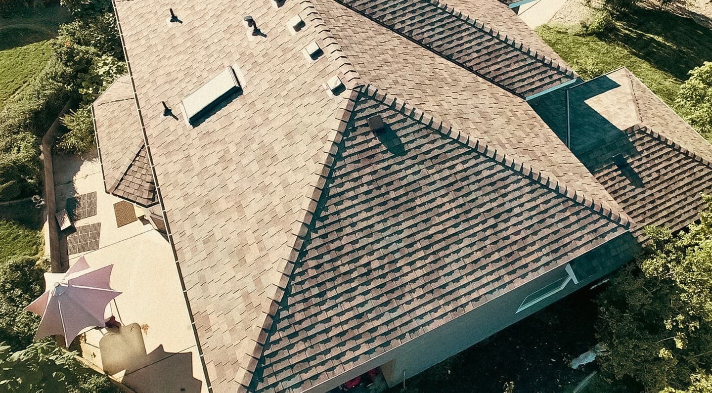Brown tan asphalt shingle roof