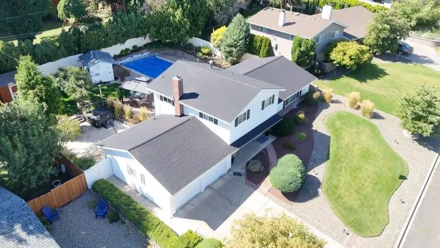 New CertainTeed Landmark in Cinder Black roof installed by Alpine Roofing on N 52nd Ave, Yakima