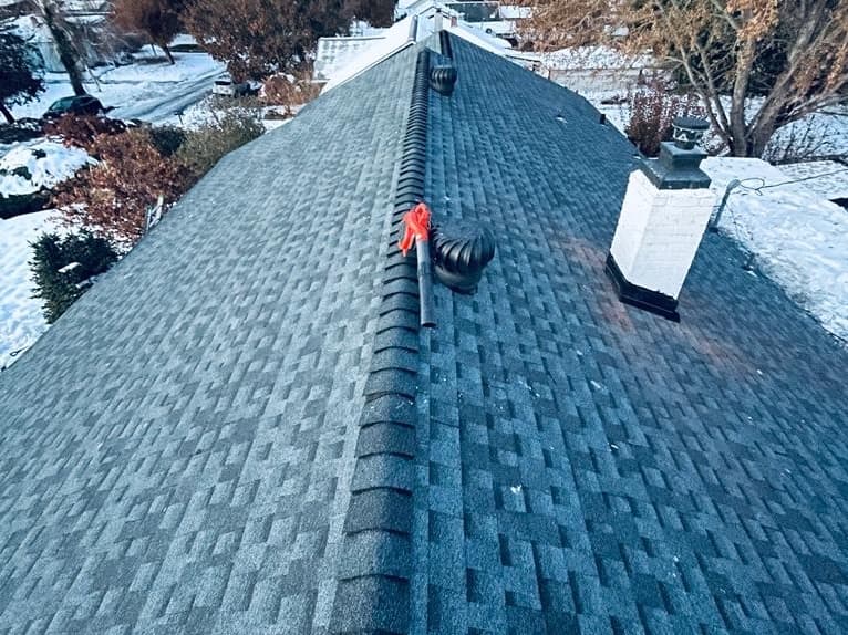Overhead photo of a Yakima WA roofing project that features a black and gray shingle roof.