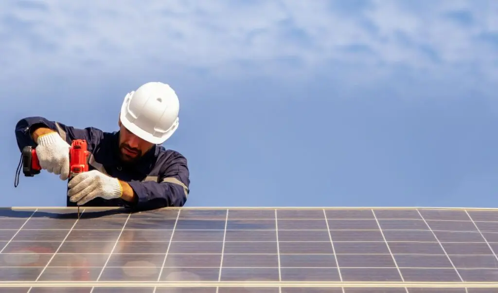 are solar panels worth it spokane roof worker installing solar panel