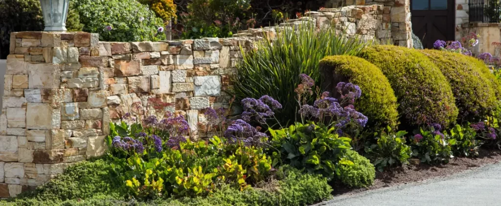 Plant beds enhanced with fun-size retaining walls for decorative landscaping