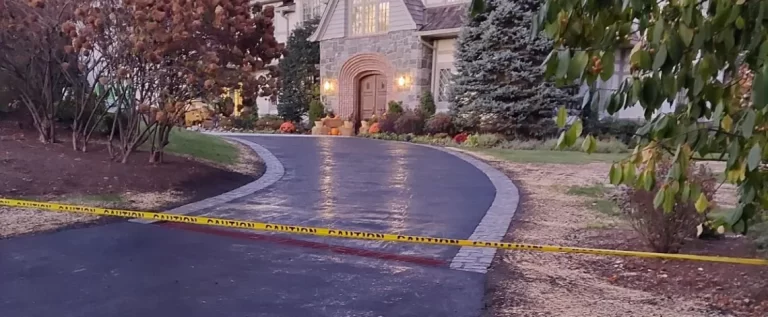 Can Driveways Be Resurfaced Resurfaced driveway showing smooth finish and improved curb appeal