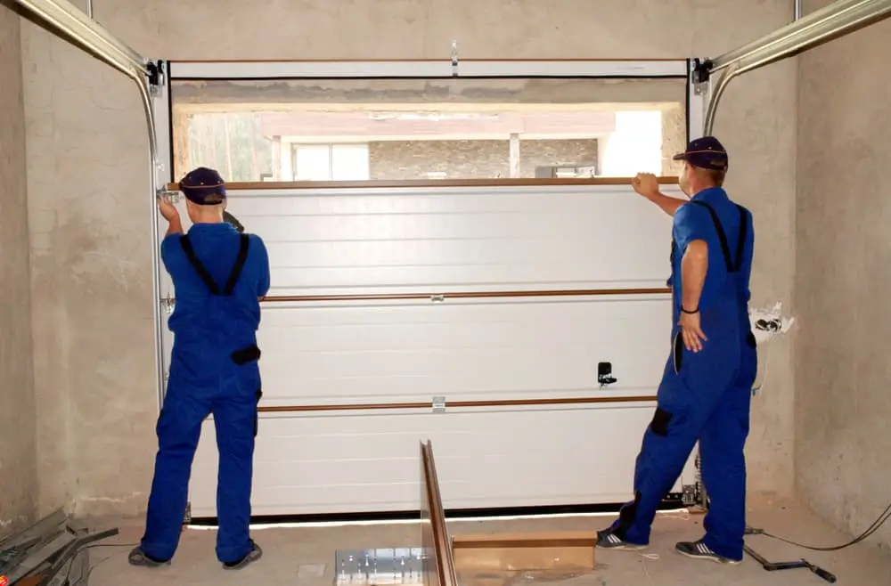 experts installing a garage door