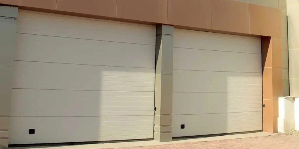 how to tell if garage door spring is broken