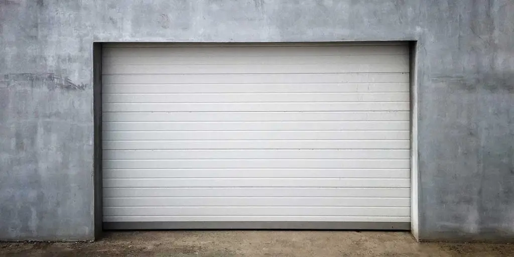 garage door makes grinding noise when fully closed