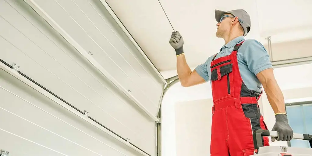 how to get the garage door back on track