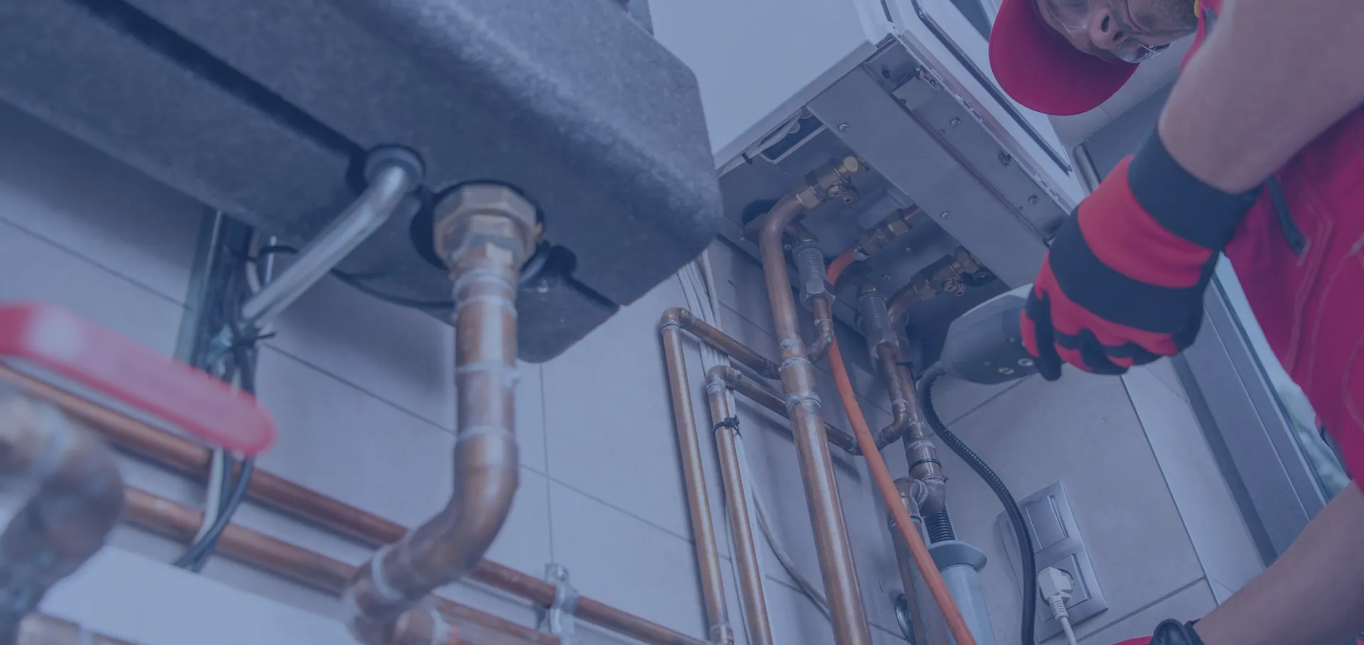 plumber repairing pipes
