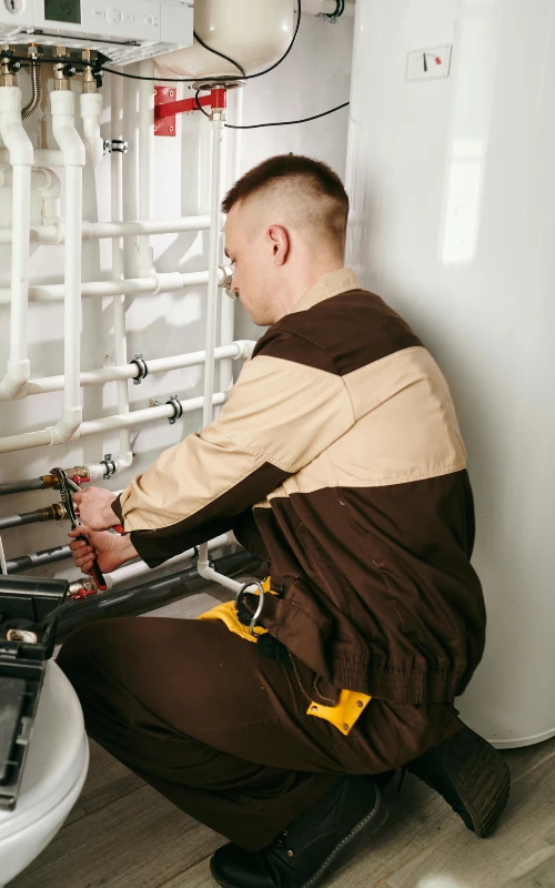 plumber working on a repair