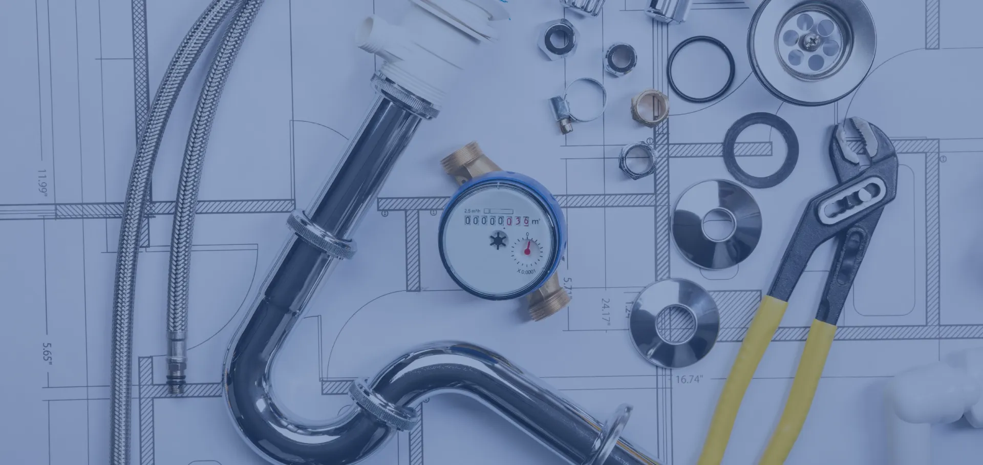 plumbing tools and blueprint