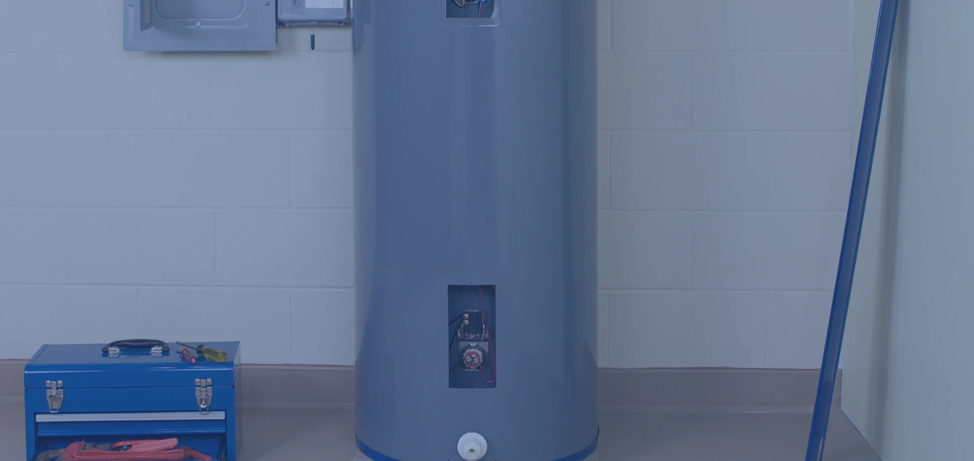 water heater tank beside toolbox