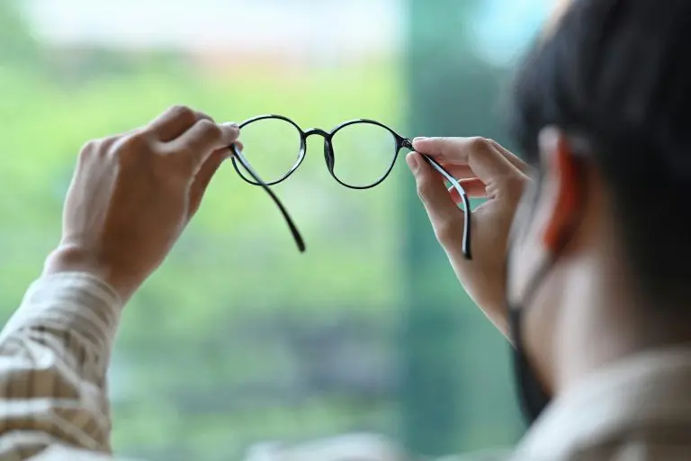 a man holding progressive lens