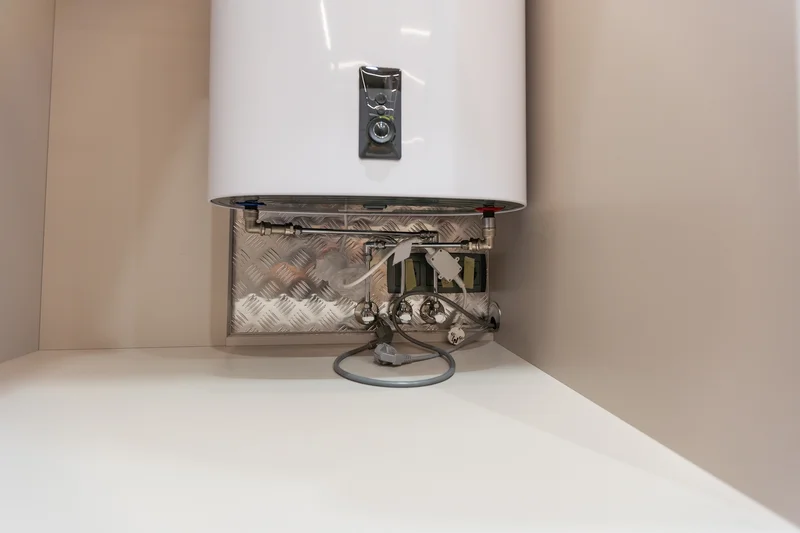 water heaters wall mounted gas boiler unit in empty room