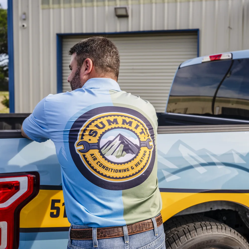 Summit AC crew member wearing uniform