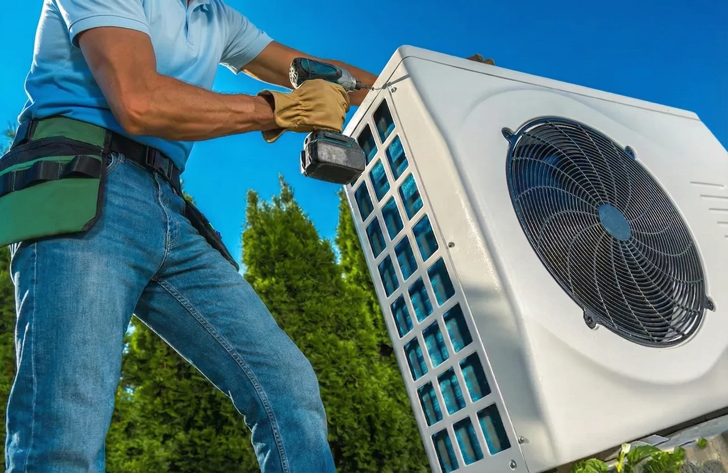 HVAC contractor working on an outdoor unit