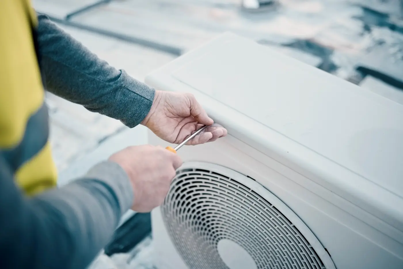 Man working on an HVAC unit