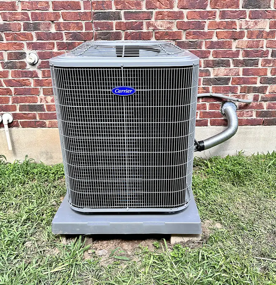 AC condenser with refrigerant lines