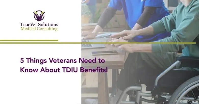 Veterans and caregivers reviewing documents related to VA disability claims.