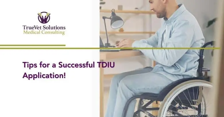 Tips for a Successful TDIU Application! Veteran in wheelchair working on VA disability claim at home.