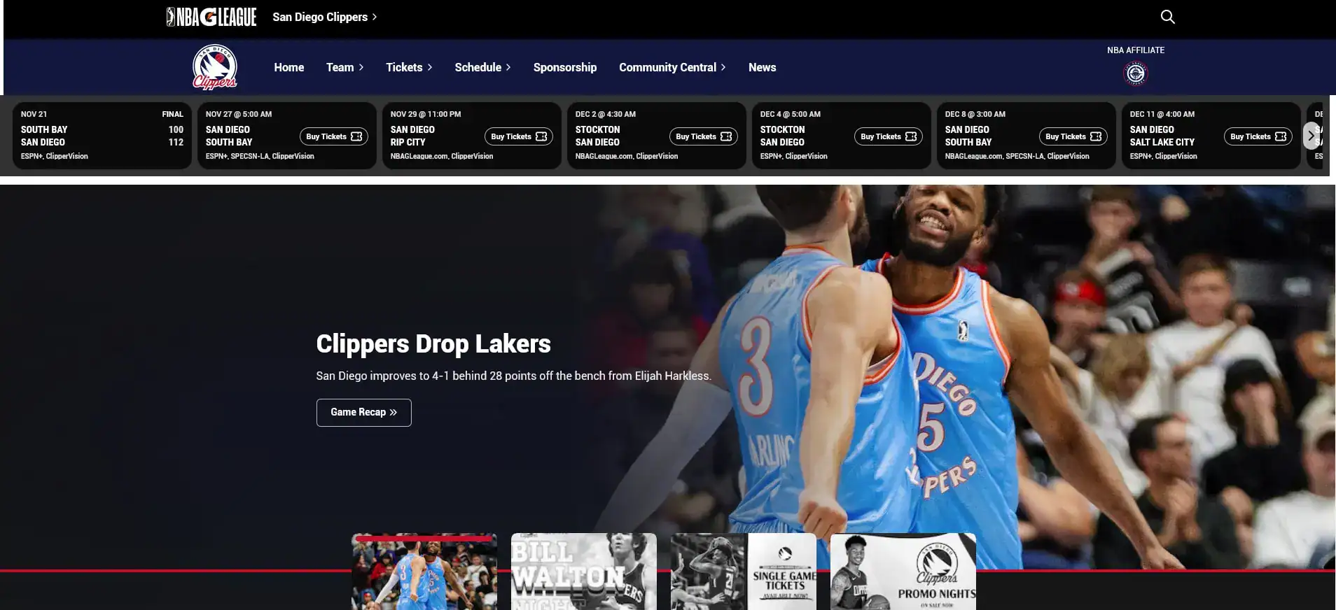 San Diego Clippers players celebrating during a game at the arena.