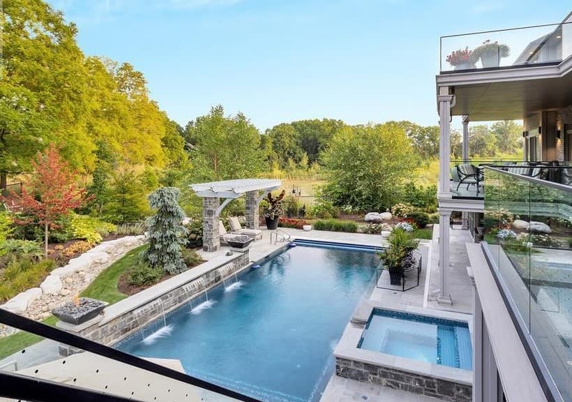 CUSTOM POOL AND SPA WITH WATER FEATURE