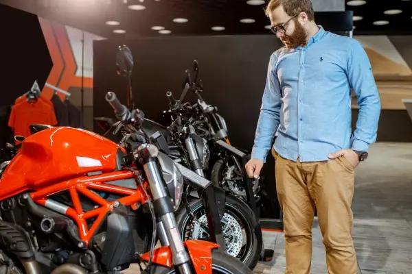 Man at motorcycle dealership