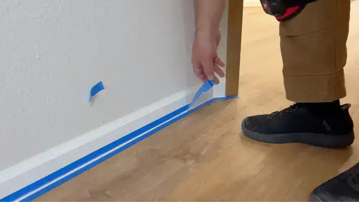 Covering and taping all areas not being painted
